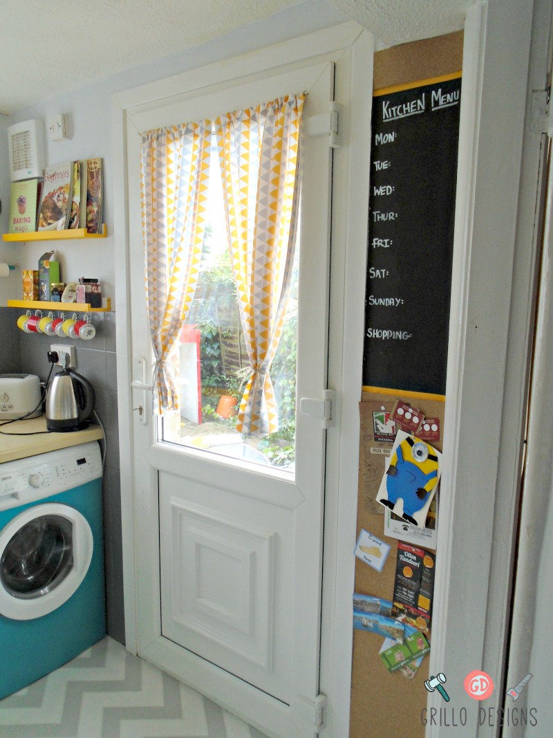 Kitchen door with yellow and gray curtains