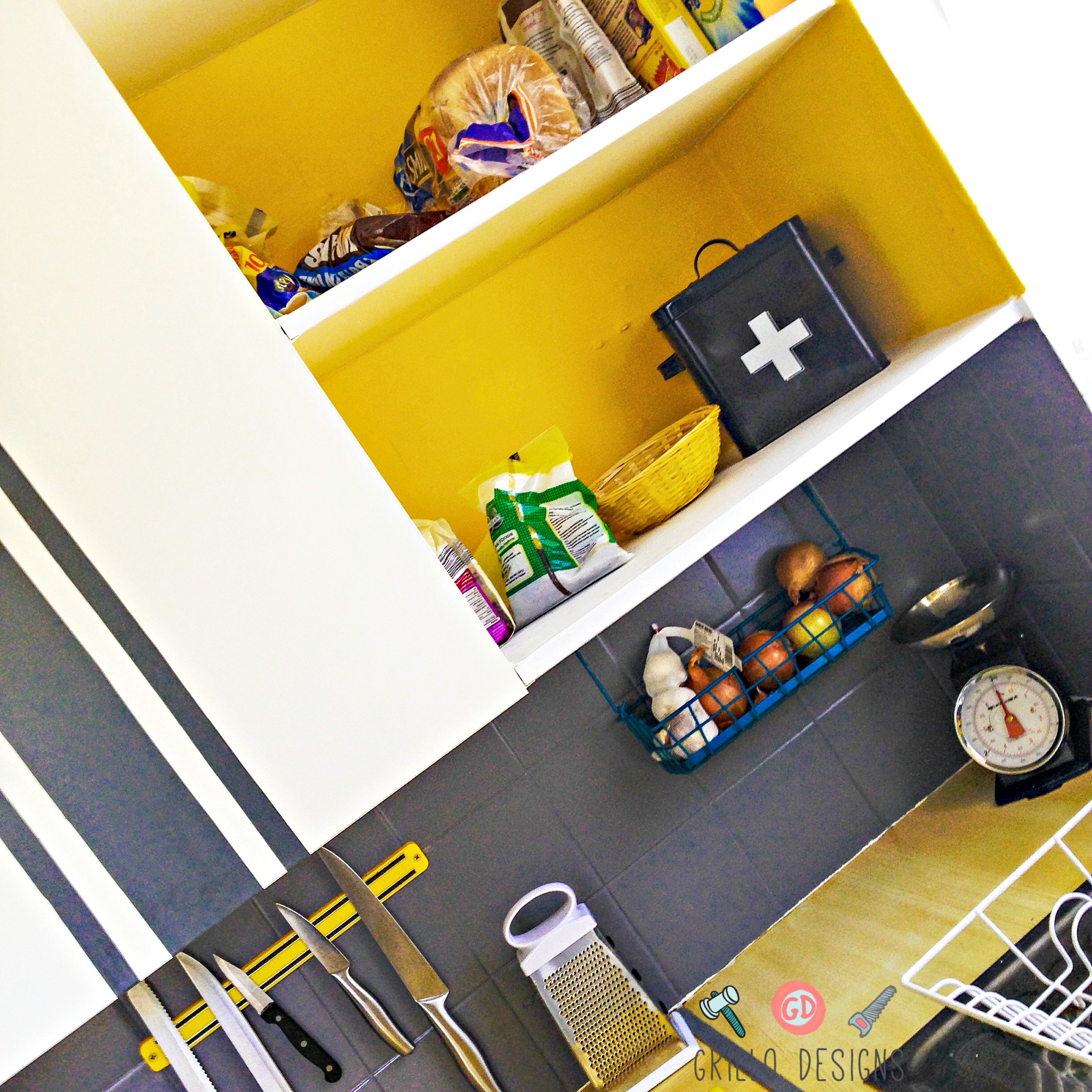 Cabinets turned to open shelving and painted white and yellow
