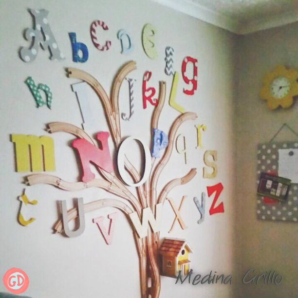 Close image of the wooden letters on the tree