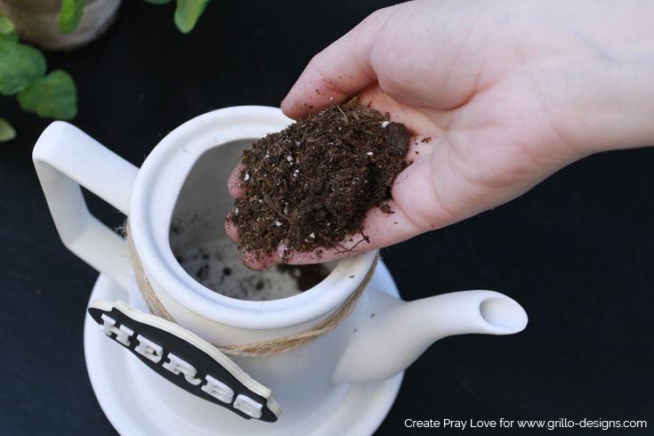 Add soil to your teapot planter / Create Pray Love for www.grillo-designs.com