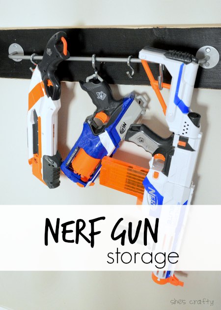 IKEA toy storage hacks for the bedroom. IKEA BYGIL rail for nerf gun storage via Shes crafty / www.grillo-designs.com