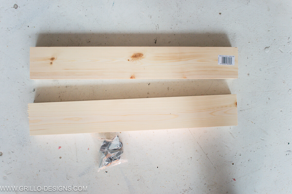 use the smaller pieces of wood to create the sides for the overbed table