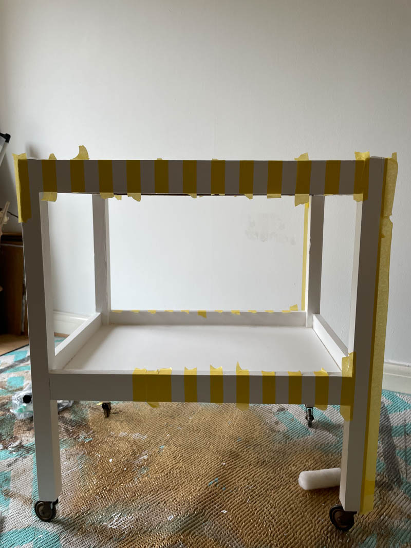 frog tape applied to bar cart after it is painted white