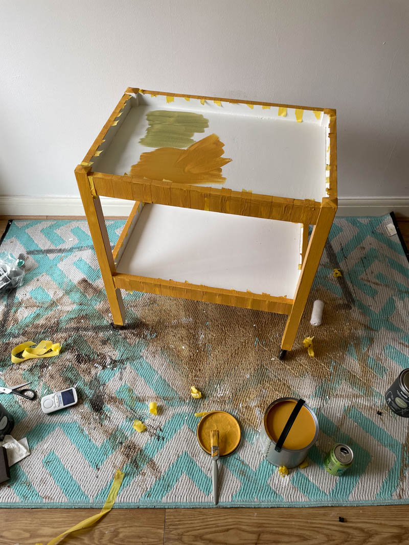 DIY bar cart being painted with old gold colour paint