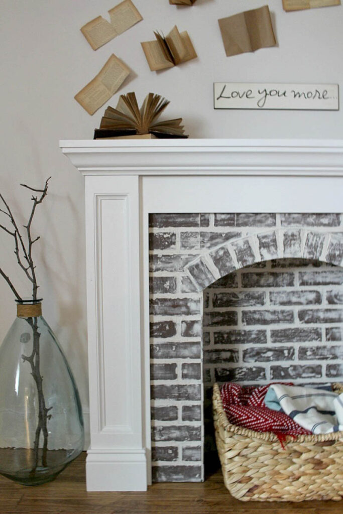 faux brick fireplace with white mantle 