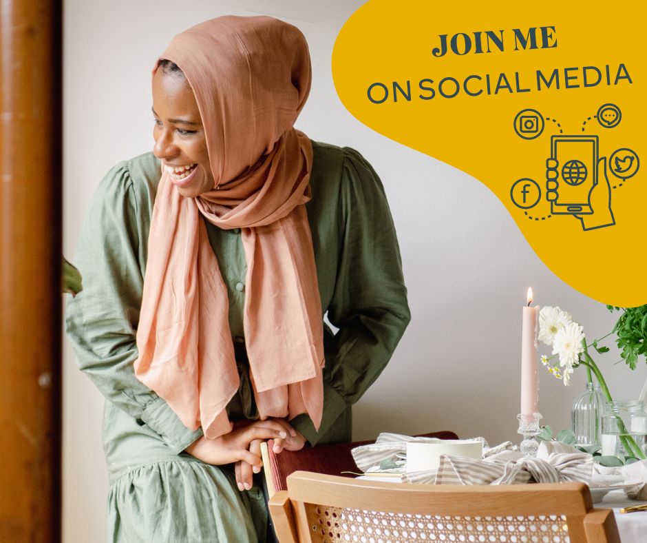Medina is wearing a sage green shirt dress, holding the back of a chair and is laughing joyfully. She is wearing a pink hijab. In a yellow bubble top right, you can see the words join me on social media